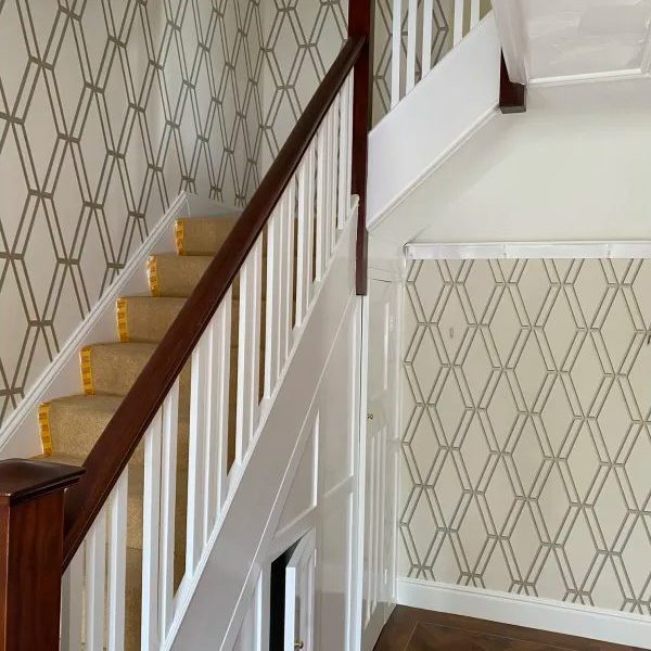 Polygonal wallpaper in home stairs and landing