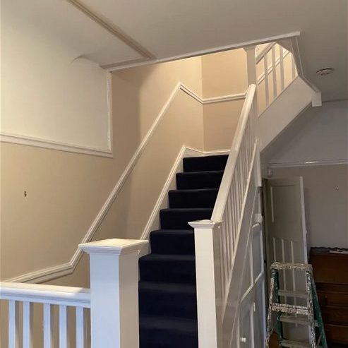 White painted stairs and landing